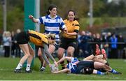 14 April 2024; Sarah Hendy of Athy scores a try despite the tackles of Ciara Lee-Jenkinson, left, and Orla Hayes of Ashbourne during the Cusack Plate final match between Athy and Ashbourne during the Bank of Ireland Leinster Rugby Women Finals Day at Balbriggan RFC in Dublin. Photo by Ben McShane/Sportsfile