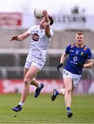 14 April 2024; Darragh Kirwan of Kildare in action against Christopher O'Brien of Wicklow during the Leinster GAA Football Senior Championship quarter-final match between Kildare and Wicklow at Laois Hire O’Moore Park in Portlaoise, Laois. Photo by Piaras Ó Mídheach/Sportsfile