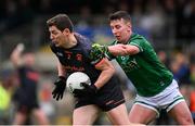 14 April 2024; Paddy Burns of Armagh in action against Shane McGullion of Fermanagh during the Ulster GAA Football Senior Championship quarter-final match between Fermanagh and Armagh at Brewster Park in Enniskillen, Fermanagh. Photo by Ramsey Cardy/Sportsfile