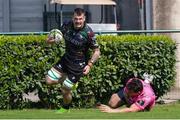 14 April 2024;  Denis Buckley of Connacht goes to score try  during the EPCR Challenge Cup quarter-final match between Benetton and Connacht at Stadio Monigo in Treviso, Italy. Photo by Roberto Bregani/Sportsfile