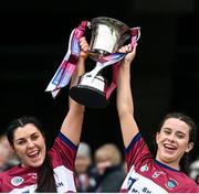 14 April 2024; Westmeath joint captains Julie McLoughlin, left, and Aoife O'Malley lift the trophy after the Very Camogie All-Ireland League Division 2A Final between Derry and Westmeath at Croke Park in Dublin. Photo by David Fitzgerald/Sportsfile