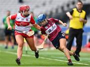 14 April 2024; Aoife O'Malley of Westmeath in action against Eimhear McGuigan of Derry during the Very Camogie All-Ireland League Division 2A Final between Derry and Westmeath at Croke Park in Dublin. Photo by David Fitzgerald/Sportsfile