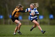 14 April 2024; Allie Henry of Athy is tackled by Laura Mahon of Ashbourne during the Cusack Plate final match between Athy and Ashbourne during the Bank of Ireland Leinster Rugby Women Finals Day at Balbriggan RFC in Dublin. Photo by Ben McShane/Sportsfile
