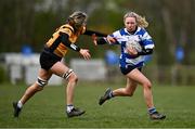 14 April 2024; Allie Henry of Athy is tackled by Laura Mahon of Ashbourne during the Cusack Plate final match between Athy and Ashbourne during the Bank of Ireland Leinster Rugby Women Finals Day at Balbriggan RFC in Dublin. Photo by Ben McShane/Sportsfile