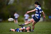 14 April 2024; Liz Brophy of Athy kicks a conversion, as teammate Meabh Collins holds the ball on the tee during the Cusack Plate final match between Athy and Ashbourne during the Bank of Ireland Leinster Rugby Women Finals Day at Balbriggan RFC in Dublin. Photo by Ben McShane/Sportsfile