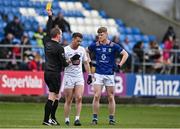 14 April 2024; Niall Kelly of Kildare is shown a yellow card by referee Sean Lonergan during the Leinster GAA Football Senior Championship quarter-final match between Kildare and Wicklow at Laois Hire O’Moore Park in Portlaoise, Laois. Photo by Sam Barnes/Sportsfile