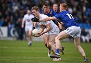 14 April 2024; Daniel Flynn of Kildare in action against Christopher O'Brien, 11, and Patrick O'Keane of Wicklow during the Leinster GAA Football Senior Championship quarter-final match between Kildare and Wicklow at Laois Hire O’Moore Park in Portlaoise, Laois. Photo by Sam Barnes/Sportsfile