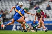 14 April 2024; Niamh McPeake of Galway in action against Clodagh McIntyre and Caoimhe Maher of Tipperary during the Very Camogie League Division 1A Final between Tipperary and Galway at Croke Park in Dublin. Photo by Brendan Moran/Sportsfile