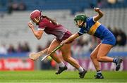 14 April 2024; Orlaith McGrath of Galway gathers the sliotar ahead of Caoimhe Maher of Tipperary during the Very Camogie League Division 1A Final between Tipperary and Galway at Croke Park in Dublin. Photo by Brendan Moran/Sportsfile