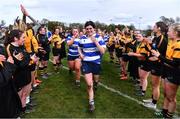 14 April 2024; Athy captain Liz Brophy leads her side through the guard of honour by the Ashbourne players after her side's victory in the Cusack Plate final match between Athy and Ashbourne during the Bank of Ireland Leinster Rugby Women Finals Day at Balbriggan RFC in Dublin. Photo by Ben McShane/Sportsfile