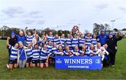 14 April 2024; Athy players and staff celebrate with the Cusack Plate after their side's victory in the Cusack Plate final match between Athy and Ashbourne during the Bank of Ireland Leinster Rugby Women Finals Day at Balbriggan RFC in Dublin. Photo by Ben McShane/Sportsfile