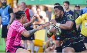 14 April 2024; Bundee Aki of Connacht in action against Jacob Umaga of Benetton during the EPCR Challenge Cup quarter-final match between Benetton and Connacht at Stadio Monigo in Treviso, Italy. Photo by Roberto Bregani/Sportsfile