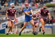 14 April 2024; Karen Kennedy of Tipperary in action against Ally Hesnan, left, and Áine Keane of Galway during the Very Camogie League Division 1A Final between Tipperary and Galway at Croke Park in Dublin. Photo by Brendan Moran/Sportsfile
