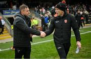14 April 2024; Fermanagh manager Kieran Donnelly, left, and Armagh manager Kieran McGeeney shake hands after the Ulster GAA Football Senior Championship quarter-final match between Fermanagh and Armagh at Brewster Park in Enniskillen, Fermanagh. Photo by Ramsey Cardy/Sportsfile