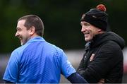 14 April 2024; Armagh manager Kieran McGeeney shares a joke with linesman Noel Mooney during the Ulster GAA Football Senior Championship quarter-final match between Fermanagh and Armagh at Brewster Park in Enniskillen, Fermanagh. Photo by Ramsey Cardy/Sportsfile