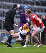 14 April 2024; Ben Brosnan of Wexford in action against Leonard Grey of Louth during the Leinster GAA Football Senior Championship quarter-final match between Louth and Wexford at Laois Hire O’Moore Park in Portlaoise, Laois. Photo by Piaras Ó Mídheach/Sportsfile