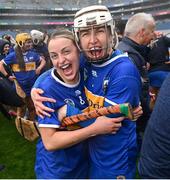 14 April 2024; Tipperary players Teresa Ryan, left, and Nicole Walsh celebrate after the Very Camogie League Division 1A Final between Tipperary and Galway at Croke Park in Dublin. Photo by David Fitzgerald/Sportsfile