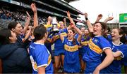 14 April 2024; Tipperary players, including Grace O'Brien, centre, celebrate with the cup after the Very Camogie League Division 1A Final between Tipperary and Galway at Croke Park in Dublin. Photo by Brendan Moran/Sportsfile