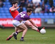 14 April 2024; Seán Nolan of Wexford in action against Dermot Campbell of Louth  during the Leinster GAA Football Senior Championship quarter-final match between Louth and Wexford at Laois Hire O’Moore Park in Portlaoise, Laois. Photo by Piaras Ó Mídheach/Sportsfile