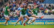 14 April 2024; Con O'Callaghan of Dublin has a shot on goal despite the efforts of Donal Keogan of Meath during the Leinster GAA Football Senior Championship quarter-final match between Dublin and Meath at Croke Park in Dublin. Photo by Brendan Moran/Sportsfile