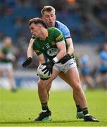 14 April 2024; Mathew Costello of Meath is tackled by Seán Bugler of Dublin during the Leinster GAA Football Senior Championship quarter-final match between Dublin and Meath at Croke Park in Dublin. Photo by Brendan Moran/Sportsfile