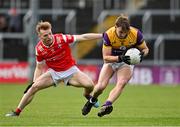 14 April 2024; Liam Coleman of Wexford in action against Ciaran Keenan of Louth during the Leinster GAA Football Senior Championship quarter-final match between Louth and Wexford at Laois Hire O’Moore Park in Portlaoise, Laois. Photo by Sam Barnes/Sportsfile