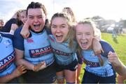 14 April 2024; MU Barnhall players, from left, Hope Lowney, Katelynn Doran and Alex Casey celebrate after their side's victory in the Flood Cup final match between Tullow and MU Barnhall during the Bank of Ireland Leinster Rugby Women Finals Day at Balbriggan RFC in Dublin. Photo by Ben McShane/Sportsfile