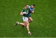 14 April 2024; Ronan Jones of Meath in action against Ross McGarry of Dublin during the Leinster GAA Football Senior Championship quarter-final match between Dublin and Meath at Croke Park in Dublin. Photo by David Fitzgerald/Sportsfile