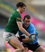 14 April 2024; Con O'Callaghan of Dublin is tackled by Adam O'Neill of Meath during the Leinster GAA Football Senior Championship quarter-final match between Dublin and Meath at Croke Park in Dublin. Photo by Brendan Moran/Sportsfile
