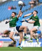 14 April 2024; Seán Coffey of Meath in action against Seán Bugler of Dublin during the Leinster GAA Football Senior Championship quarter-final match between Dublin and Meath at Croke Park in Dublin. Photo by David Fitzgerald/Sportsfile