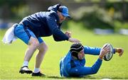 15 April 2024; Elite player development officer Aaron Dundon, left, and Brian Deeny during a Leinster Rugby squad training session at UCD in Dublin. Photo by Seb Daly/Sportsfile