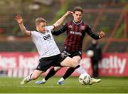 15 April 2024; Daryl Horgan of Dundalk in action against Paddy Kirk of Bohemians during the SSE Airtricity Men's Premier Division match between Bohemians and Dundalk at Dalymount Park in Dublin. Photo by Stephen McCarthy/Sportsfile