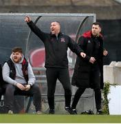 15 April 2024; Dundalk staff, from left, video analyst Dominic Corrigan, interim head coach Liam Burns and coach Brian Gartland during the SSE Airtricity Men's Premier Division match between Bohemians and Dundalk at Dalymount Park in Dublin. Photo by Stephen McCarthy/Sportsfile
