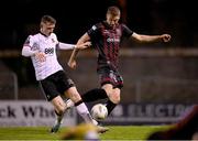 15 April 2024; Zak Bradshaw of Dundalk prevents Filip Piszczek of Bohemians from getting a shot on goal during the SSE Airtricity Men's Premier Division match between Bohemians and Dundalk at Dalymount Park in Dublin. Photo by Stephen McCarthy/Sportsfile
