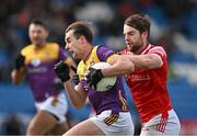 14 April 2024; Sean Nolan of Wexford in action against Dermot Campbell of Louth during the Leinster GAA Football Senior Championship quarter-final match between Louth and Wexford at Laois Hire O’Moore Park in Portlaoise, Laois. Photo by Sam Barnes/Sportsfile