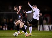 15 April 2024; Sten Reinkort of Bohemians in action against Andy Boyle of Dundalk during the SSE Airtricity Men's Premier Division match between Bohemians and Dundalk at Dalymount Park in Dublin. Photo by Stephen McCarthy/Sportsfile
