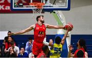 13 April 2024; Karlo Lebo of Moy Tolka Rovers blocks the shot of Jonathon Jean of UCD Marian during the InsureMyVan.ie Division 1 play-off final match between UCD Marian and Moy Tolka Rovers at the National Basketball Arena in Tallaght, Dublin. Photo by Tyler Miller/Sportsfile