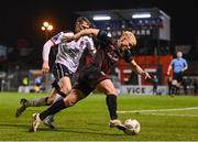 15 April 2024; Michael Lilander of Bohemians in action against Zak Bradshaw of Dundalk during the SSE Airtricity Men's Premier Division match between Bohemians and Dundalk at Dalymount Park in Dublin. Photo by Stephen McCarthy/Sportsfile