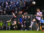 15 April 2024; James McManus of Bohemians in action against Paul Doyle of Dundalk during the SSE Airtricity Men's Premier Division match between Bohemians and Dundalk at Dalymount Park in Dublin. Photo by Stephen McCarthy/Sportsfile