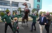 16 April 2024; I Am Maximus rears up, flanked by grooms Rachel Robins and Steven Cahill, alongside jockey Paul Townend, left, and trainer Willie Mullins, right, during the homecoming of Aintree Grand National winner I Am Maximus at Lord Bagenal Inn, Leighlinbridge in Carlow. Photo by Seb Daly/Sportsfile