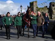 16 April 2024; I Am Maximus with jockey Paul Townend, left, grooms Rachel Robins and Steven Cahill and trainer Willie Mullins during the homecoming of Aintree Grand National winner I Am Maximus in Leighlinbridge, Carlow. Photo by Seb Daly/Sportsfile