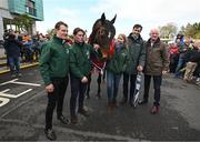 16 April 2024; I Am Maximus with, from left, jockey Paul Townend, groom Steven Cahill, Nicola Fitzgerald of Randox, Marc Coppez of Randox, and trainer Willie Mullins during the homecoming of Aintree Grand National winner I Am Maximus at Lord Bagenal Inn in Leighlinbridge, Carlow. Photo by Seb Daly/Sportsfile