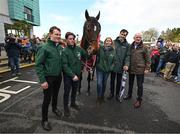 16 April 2024; I Am Maximus with, from left, jockey Paul Townend, groom Steven Cahill, Nicola Fitzgerald of Randox, Marc Coppez of Randox, and trainer Willie Mullins during the homecoming of Aintree Grand National winner I Am Maximus at Lord Bagenal Inn in Leighlinbridge, Carlow. Photo by Seb Daly/Sportsfile