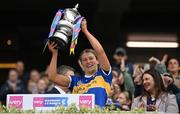 14 April 2024; Tipperary captain Karen Kennedy lifts the cup after the Very Camogie League Division 1A Final between Tipperary and Galway at Croke Park in Dublin. Photo by Brendan Moran/Sportsfile