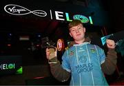 18 April 2024; JP Sleator of UCD poses for a photograph with the trophy after the Virgin Media ELOI Finals at The Camden Sports Bar in Dublin. Photo by Tyler Miller/Sportsfile
