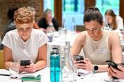 19 April 2024; Attendees complete a survey on their phones during the Professional Women in Sport, Exercise, Physical Activity and Health network event at the Farnham Estate in Cavan. Photo by Sam Barnes/Sportsfile