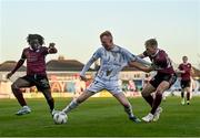 19 April 2024; Shane Farrell of Shelbourne in action against Conor McCormack, right, and Al-Amin Kazeem of Galway United during the SSE Airtricity Men's Premier Division match between Galway United and Shelbourne at Eamonn Deacy Park in Galway. Photo by Sam Barnes/Sportsfile