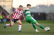 19 April 2024; Markus Poom of Shamrock Rovers in action against Ronan Boyce of Derry City during the SSE Airtricity Men's Premier Division match between Derry City and Shamrock Rovers at the Ryan McBride Brandywell Stadium in Derry. Photo by Stephen McCarthy/Sportsfile