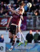 19 April 2024; Sean Boyd of Shelbourne has  a header at goal under pressure from Robert Slevin of Galway United during the SSE Airtricity Men's Premier Division match between Galway United and Shelbourne at Eamonn Deacy Park in Galway. Photo by Sam Barnes/Sportsfile