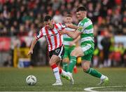 19 April 2024; Danny Mullen of Derry City in action against Josh Honohan of Shamrock Rovers during the SSE Airtricity Men's Premier Division match between Derry City and Shamrock Rovers at the Ryan McBride Brandywell Stadium in Derry. Photo by Stephen McCarthy/Sportsfile